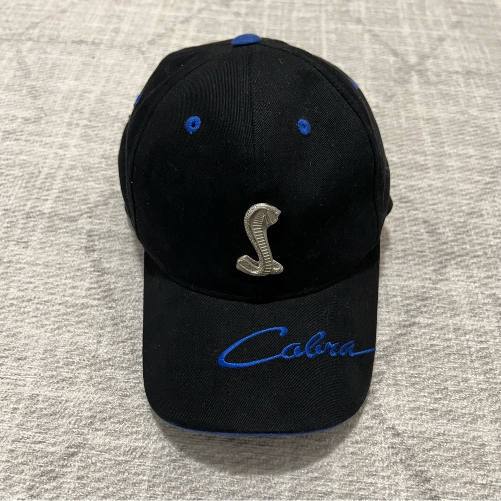 The Ford Collection Metal Cobra Logo Men’s Black Adjustable Strapback Hat